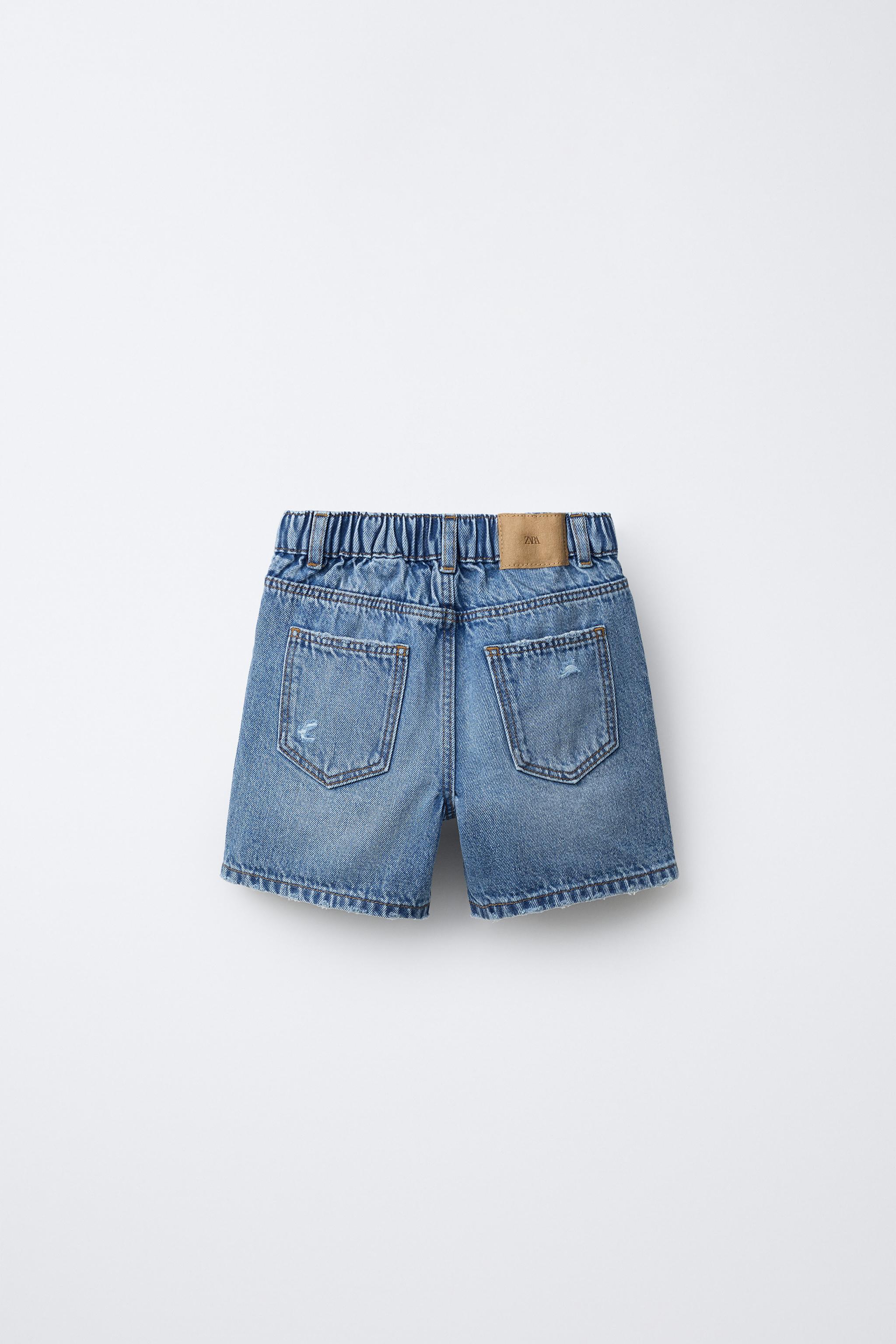 BERMUDA EN JEAN BAGGY DÉCHIRÉ
